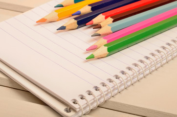 Group of colorful pencil and notepad