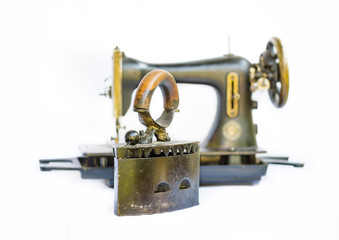 Old iron and sewing machine still life