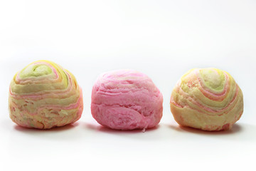 Chinese pastry in rainbow color on white background