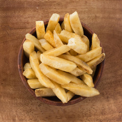 french fries on wood plate