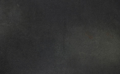 Closeup fabric at the black mouse pad background © kenkuza