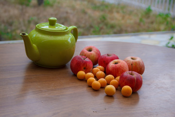 Green tea on the table with apples