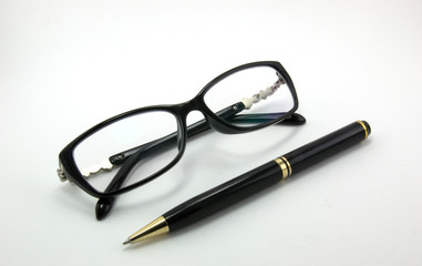 Glasses and pen