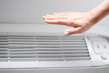 Check air conditioner heat or room temperature