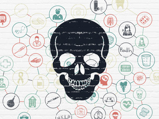 Healthcare concept: Scull on wall background