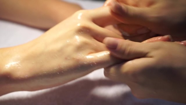 Hands massage in the spa salon