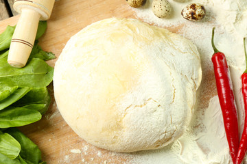 Food ingredients for pizza on table close up