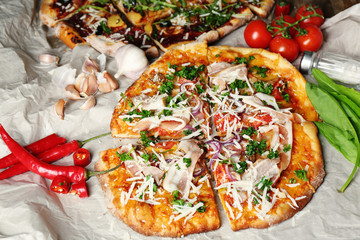 Tasty pizza with vegetables on table close up