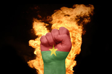 fire fist with the national flag of burkina faso