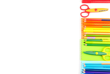 Colorful school stationery isolated on white