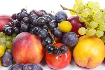 seasonal fruits, grapes, plums, pears isolated on a white backgr