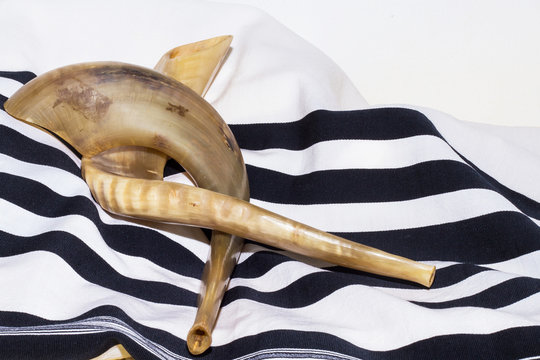 Two shofar with shawl (talit In Hebrew)