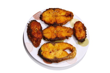 Slices of Rohu fish fry served on white plate