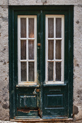 old green door with glass