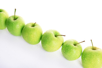 Ripe green apples isolated on white