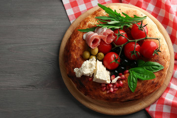 Ingredients of Mediterranean cuisine, on wooden background
