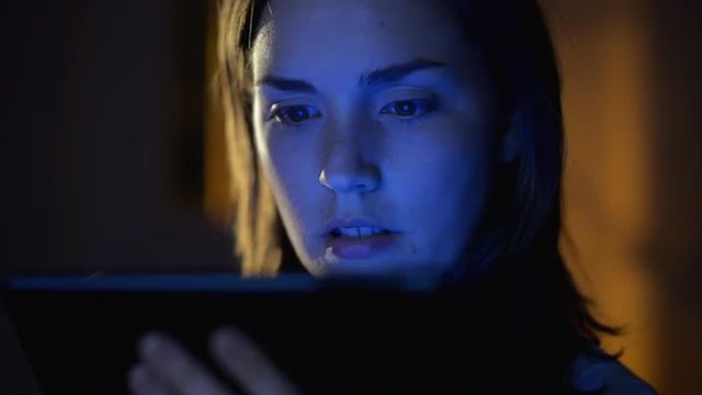 woman hacking tablet computer security threath touchscreen close-up