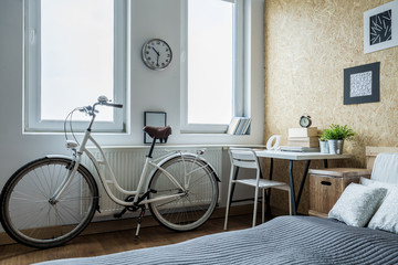 Girl's bike in contemporary bedroom