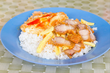 Crispy streaky pork with chilli, Basil leaves, corn, fried egg ,