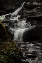 Mountain waterfall, cascading over rocks