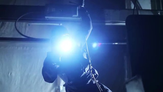 Special Forces Tactical Rappelling in Abandoned Building 