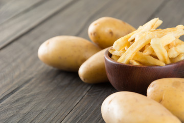 french fries on wood background