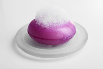 Soap with foam isolated on white