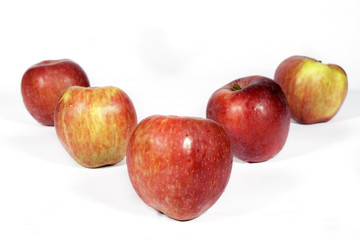 Red apples on white