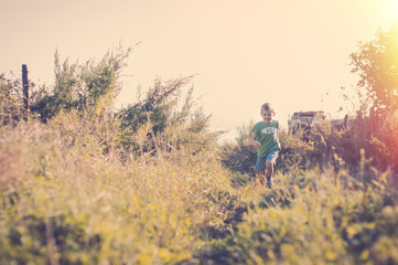Happy smiling child running to his mom