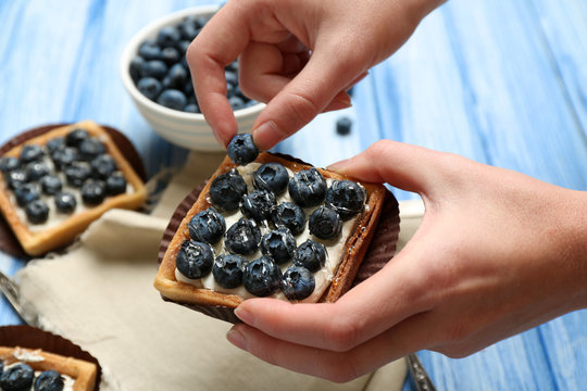 Still life with gourmet fresh blueberry tarts