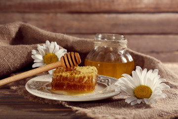 Obraz na płótnie Canvas Honey products on wooden table