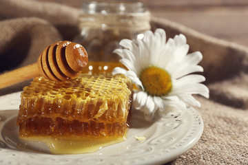Honey products on fabric background