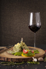 Rack of lamb mint steak, Rack of lamb steak cut in pieces seasoning with crusted mint vegetable and herbs and red wine serve on chopping wood block