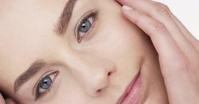 Closeup portrait of beautiful woman resting head slow motion skincare concept - Red Epic Dragon