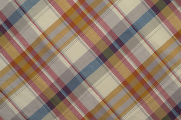 Background of Yellow,Blue,and Red Plaid Cloth Shot in Studio 
