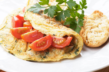 Omelet with cherry tomato