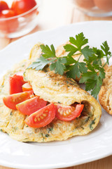 Omelet with cherry tomato