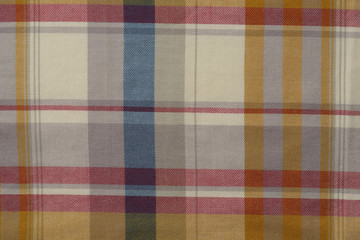 Background of Yellow,Blue,and Red Plaid Cloth Shot in Studio 