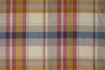 Background of Yellow,Blue,and Red Plaid Cloth Shot in Studio 