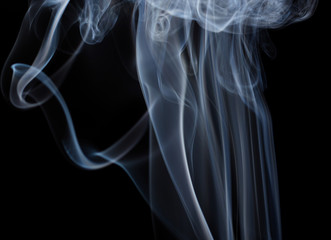 Abstract white floating smoke on dark background