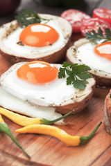 Fried eggs in potato shells