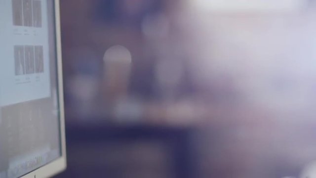 Designer is Working at Evening in Studio