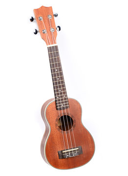 Classic ukulele Hawaiian guitar, studio shot isolated on white b