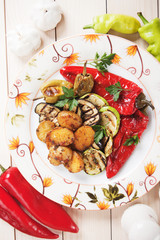 Oven baked potato and grilled vegetables
