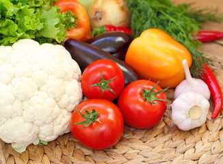 Assorted vegetables on the wooden table