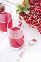 Healthy red currants in a bowl with extras