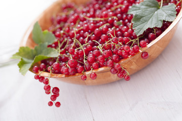 Healthy red currants in a bowl with extras
