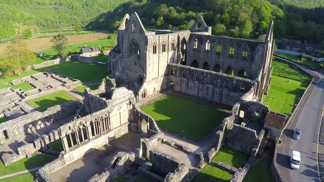 An amazing aerial view over the abandoned Tintern Abbey in Wales, United Kingdom.