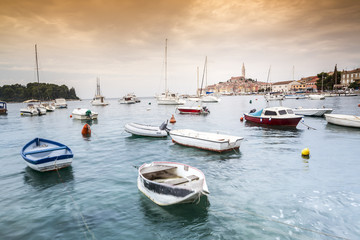 Fototapeta premium Turquoise sea and historic buildings of Rovinj, Croatia