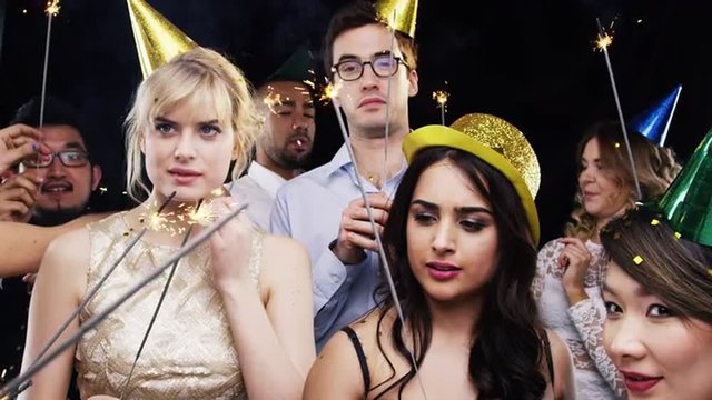 Mixed race group of friends celebrating independence day slow motion party photo booth 
